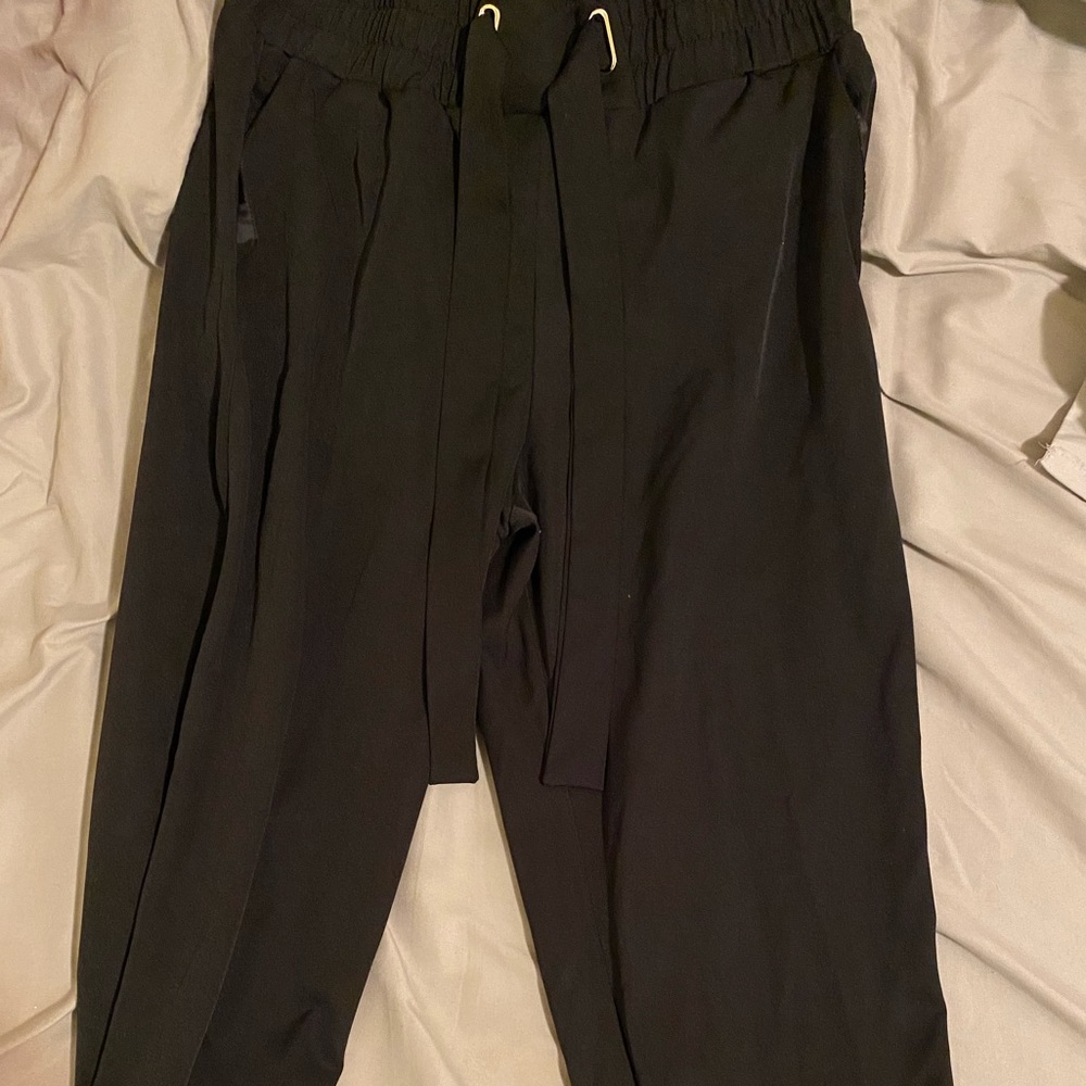 Black cuffed bottom tie pants